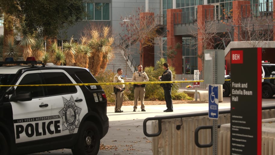 Police officers in front of the Student Union a day after three people died and one person was injured in a mass shooting at the UNLV campus on December 7, 2023. 