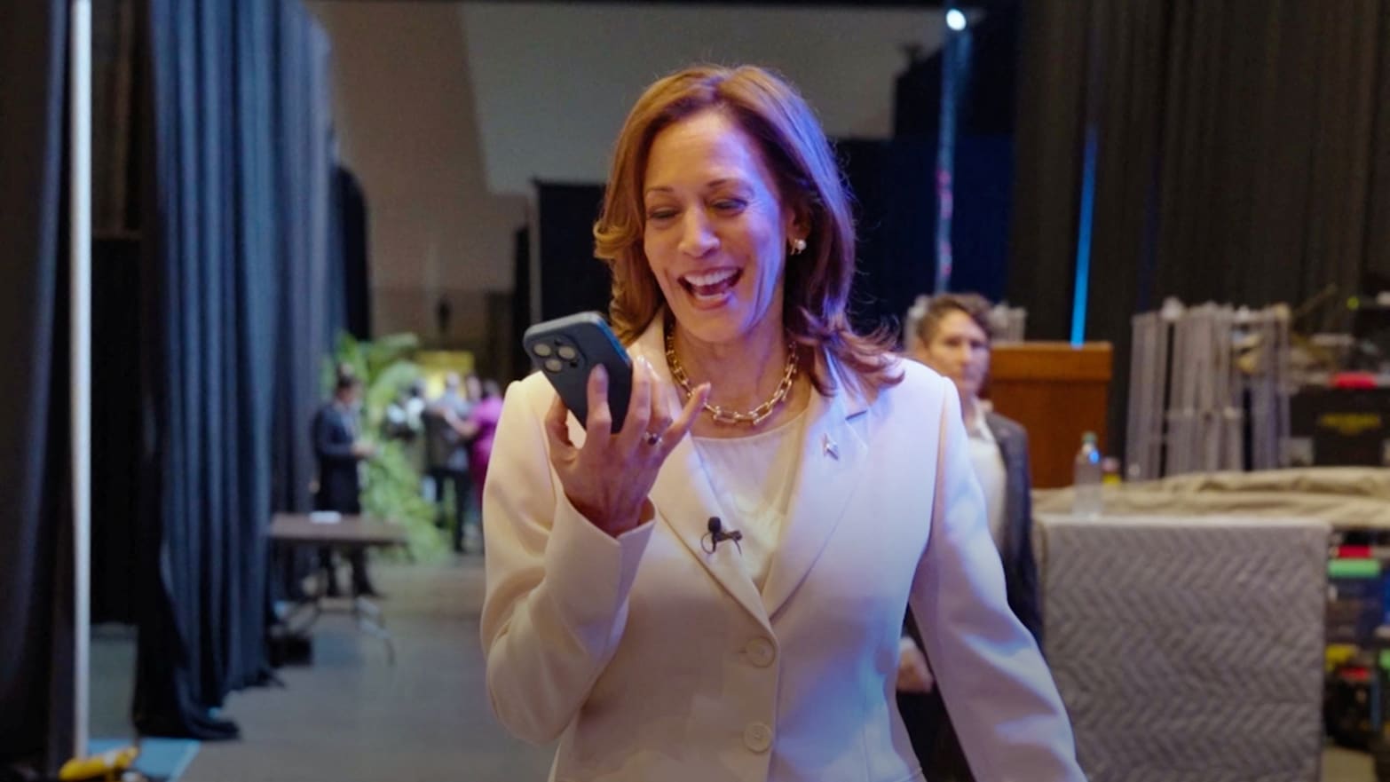 Kamala Harris speaking on a phone