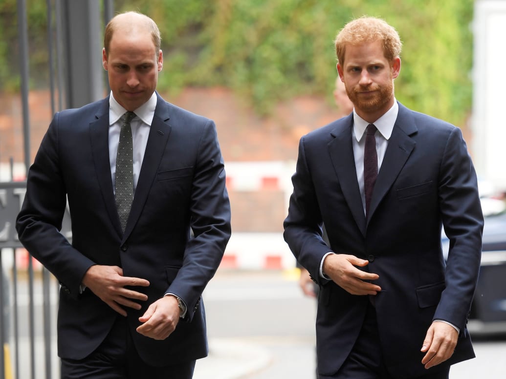 Prince William, left, and Prince Harry arrive to visit the Support4Grenfell Community Hub in London, Sept. 5, 2017.