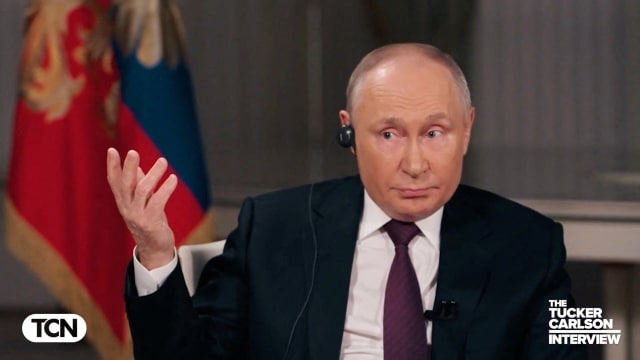 Russian President Vladimir Putin speaks during an interview with U.S. television host Tucker Carlson in Moscow.