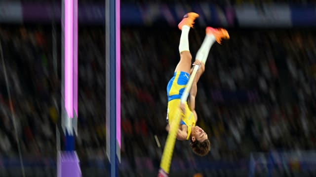 Mondo Duplantis of Sweden vaults to a new world record during the men's pole vault final at the at the 2024 Olympic Games in Paris on August 5, 2024.