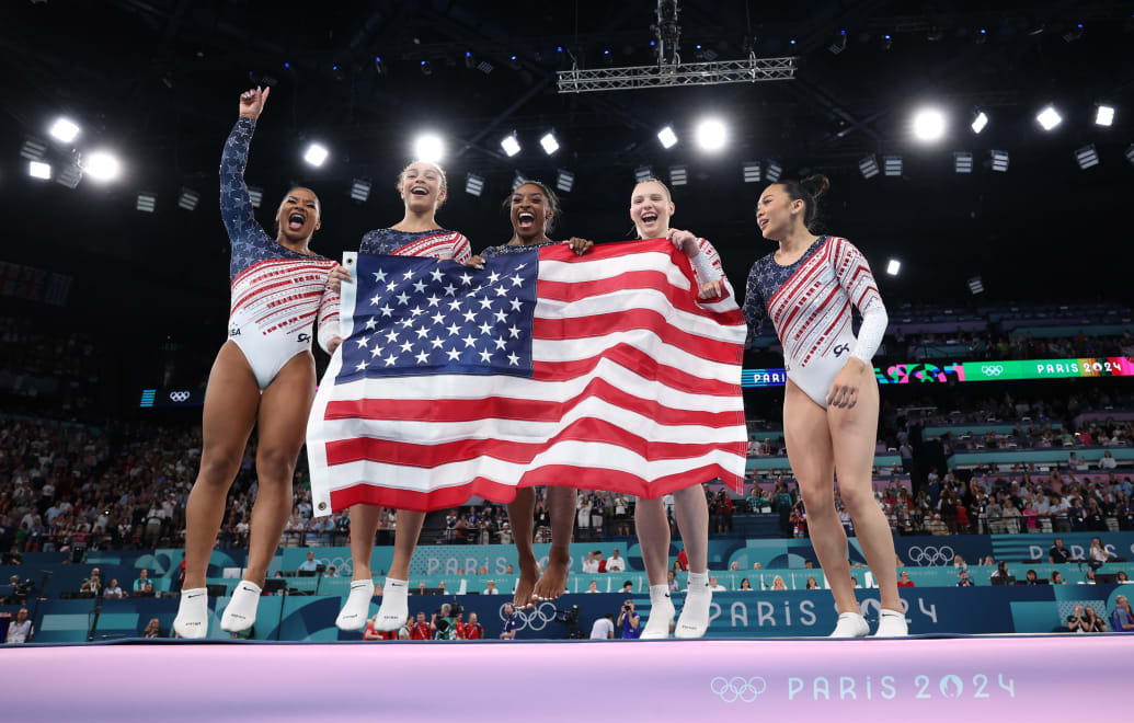 A photo of Jordan Chiles, Hezly Rivera,  Simone Biles, Jade Carey and Sunisa Lee at the Olympics