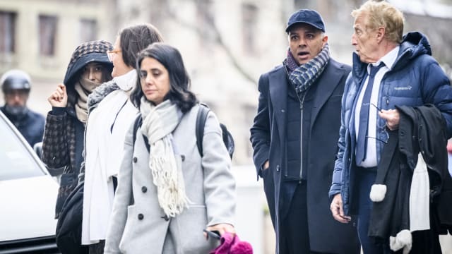 Indian-Swiss billionaire family members Namrata Hinduja (L) and Ajay Hinduja (2ndR) arrive at the Geneva's courthouse with their lawyers Yael Hayat (C) and Robert Assael (R) at the opening day of their trial for human trafficking on January 15, 2024.