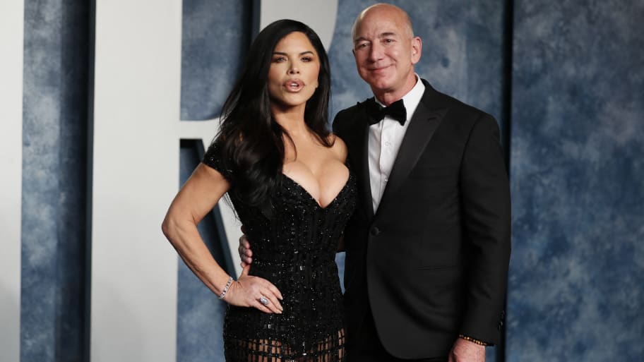 Lauren Sanchez and Jeff Bezos arrive at the Vanity Fair Oscar party after the 95th Academy Awards, in Beverly Hills, California, March 12, 2023.