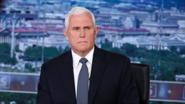 Former Vice President Mike Pence (L) visits FOX News Channel’s \"America Reports\" with John Roberts at the FOX News D.C. Bureau on January 30, 2024 in Washington, DC.