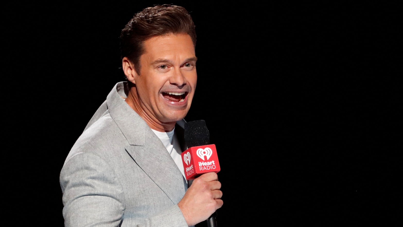 Ryan Seacrest introduces an act during the second day of the iHeartRadio Music Festival 2022 at T-Mobile Arena in Las Vegas, Nevada, U.S. September 24, 2022. 