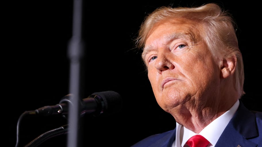 Former U.S. President and Republican presidential candidate Donald Trump pauses as he speaks at a campaign event in Council Bluffs, Iowa, U.S., July 7, 2023