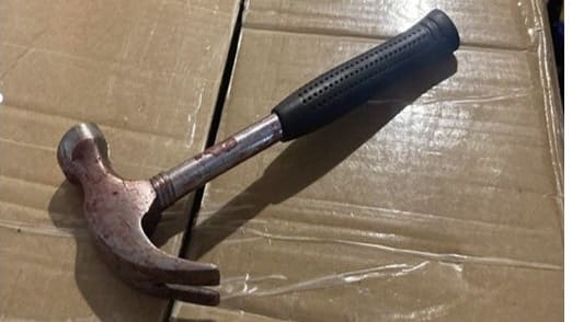 A hammer recovered from the scene of a fatal attack on a mother that also seriously injured her young children in Brooklyn, New York.