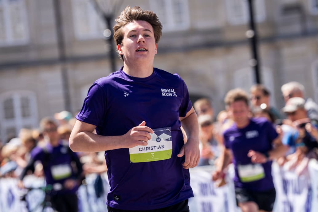Denmark's Prince Christian arrives at the finish line at the Amalienborg Castle square, after participating in a One Mile Family run, during the Royal Run event in Copenhagen, Denmark, May 29, 2023.