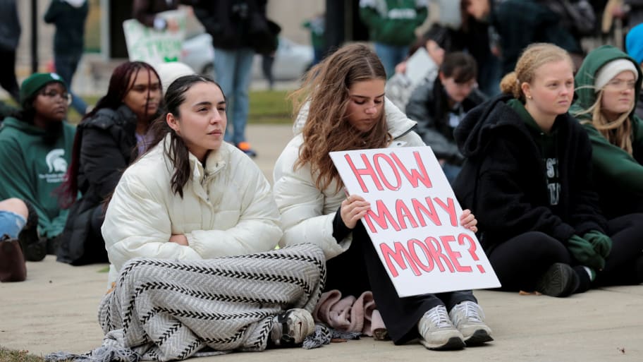 Michigan State University students protest in front of the State Capitol against guns, following a mass shooting of eight MSU students on Monday at campus, in Lansing, Michigan U.S. February 15, 2023. 
