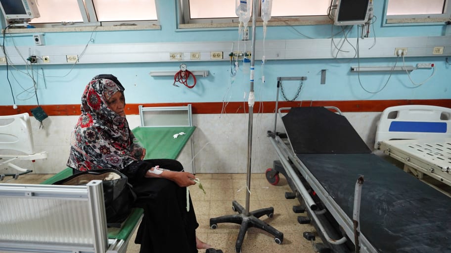 A Palestinian woman receives medical care at the European hospital in Khan Yunis in the southern Gaza Strip on May 17, 2024