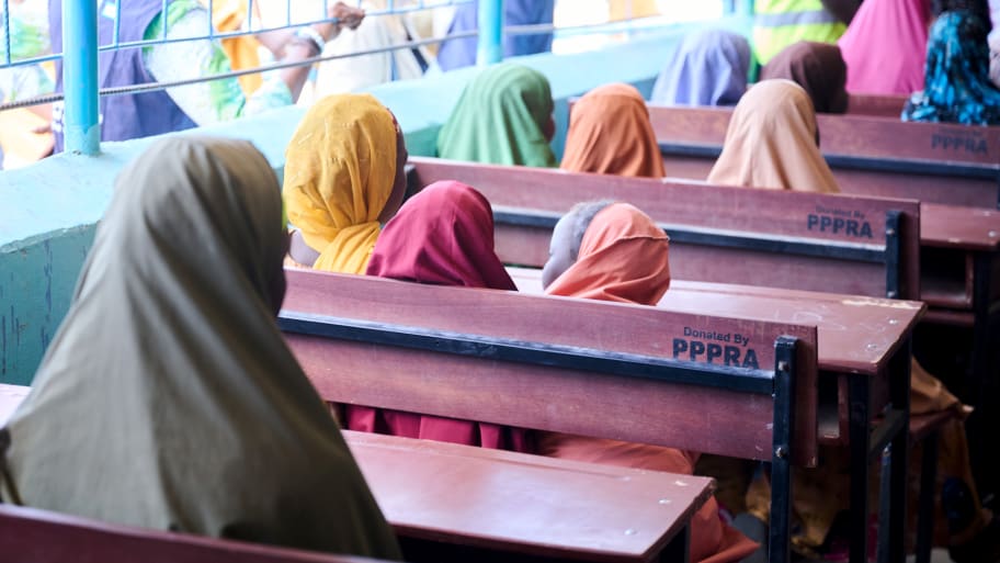 Nigerian schoolgirls sitting in a classroom.