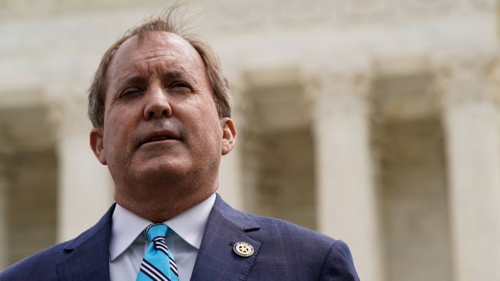 Texas Attorney General Ken Paxton speaks during a news conference in Washington, D.C., April 26, 2022.