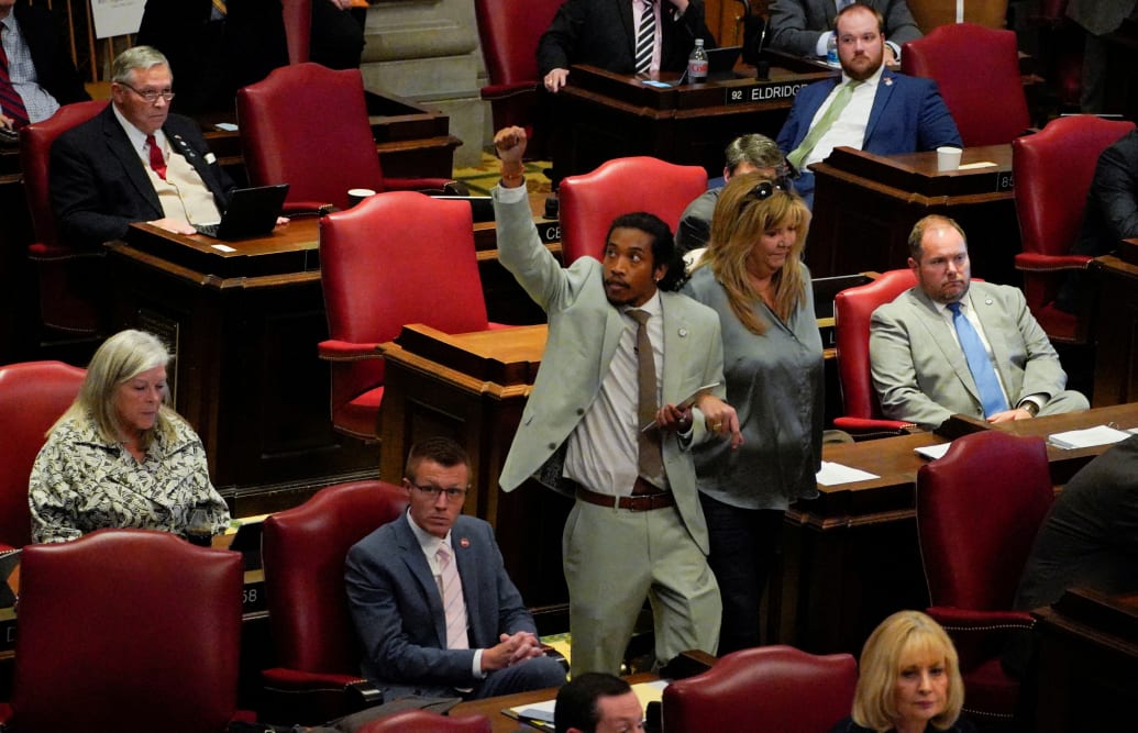 Representative Justin Jones reenters the House Chamber after being reinstated