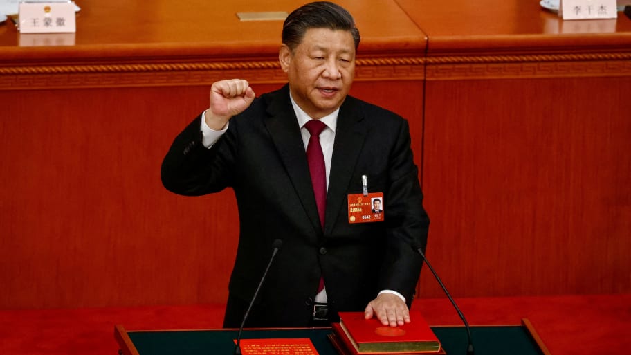 Chinese President Xi Jinping takes his oath during the Third Plenary Session of the National People's Congress (NPC) at the Great Hall of the People, in Beijing, China.