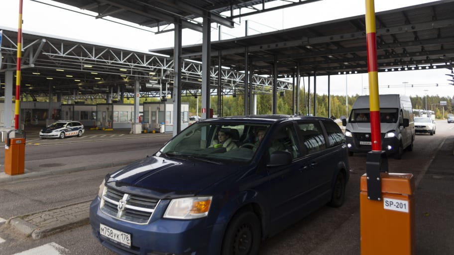A car coming from Russia crosses the border gate at the Vaalimaa border checkpoint between Finland and Russia in Virolahti, Finland, on Sept. 28, 2022.