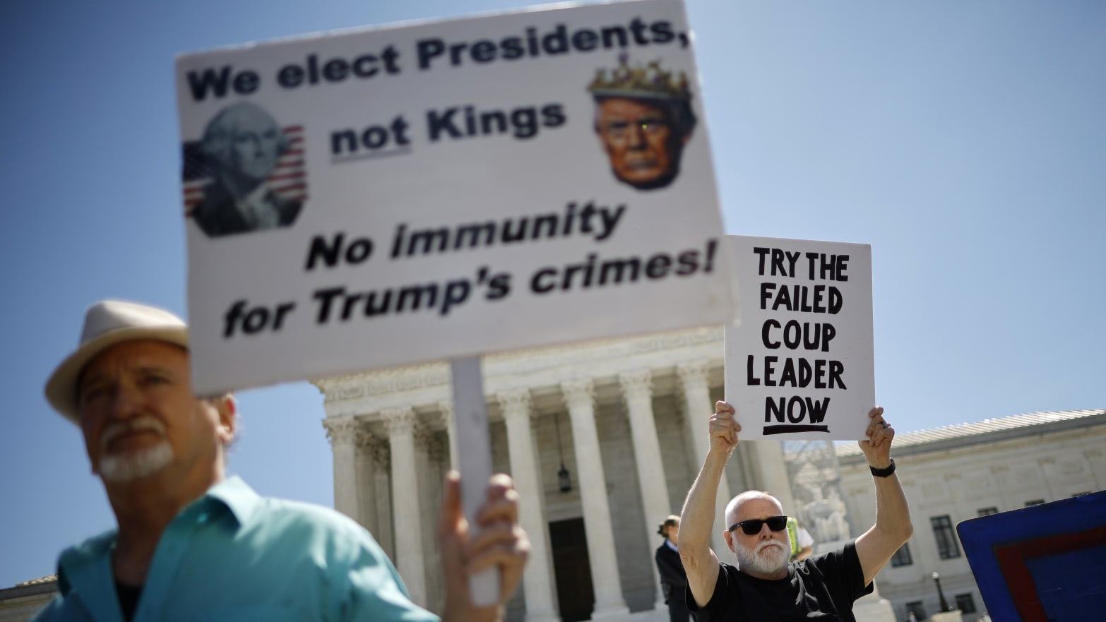 Demonstrators participate in a rally outside the U.S. Supreme Court after it's ruling in Trump v. United States