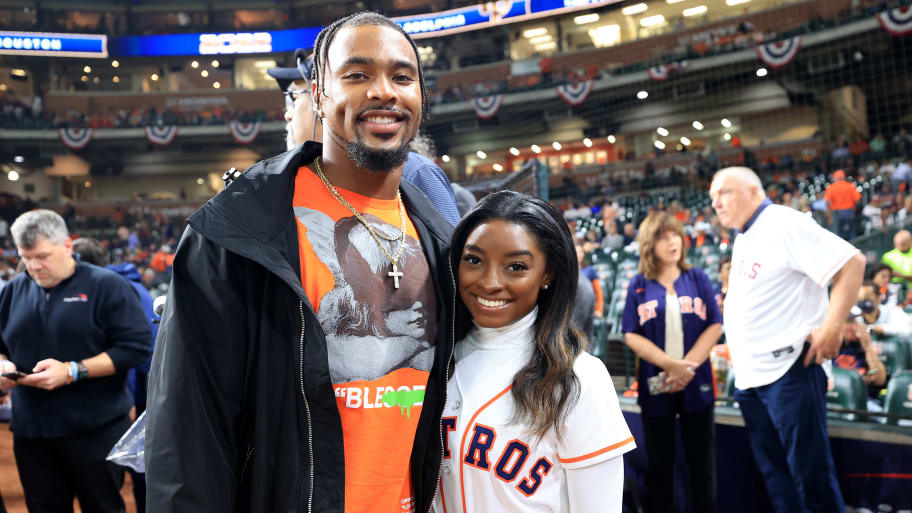 Simone Biles and her husband Jonathan Owens at a baseball game. 