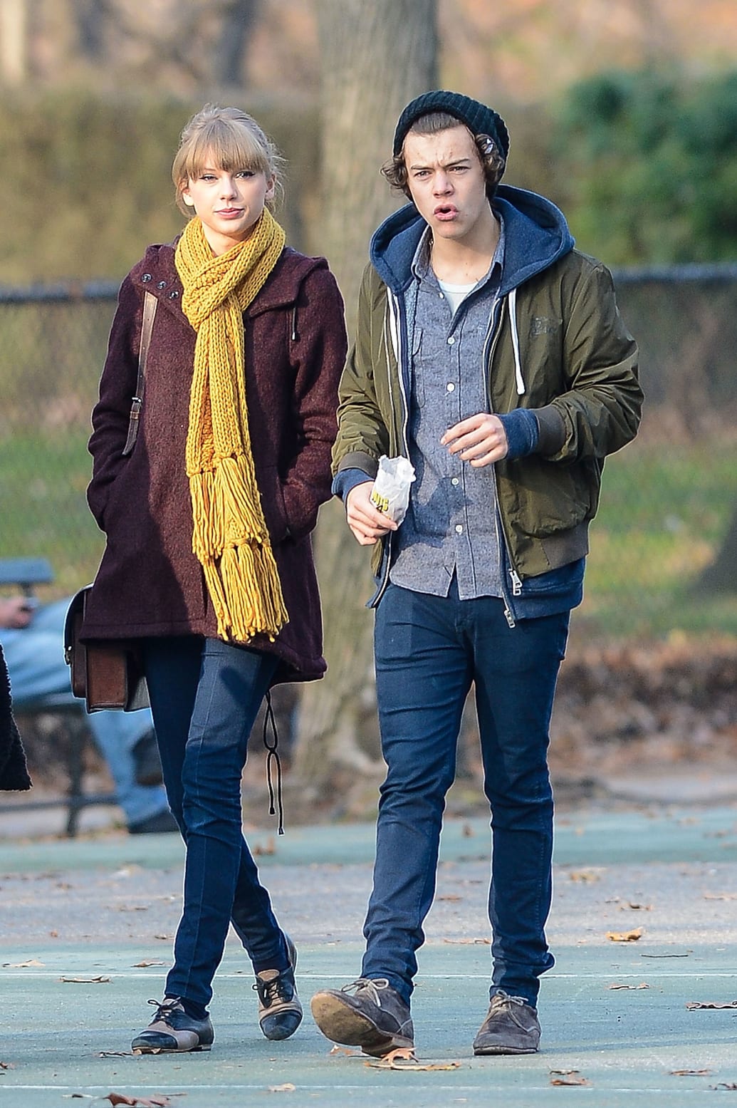 A photo including Taylor Swift and Harry Styles