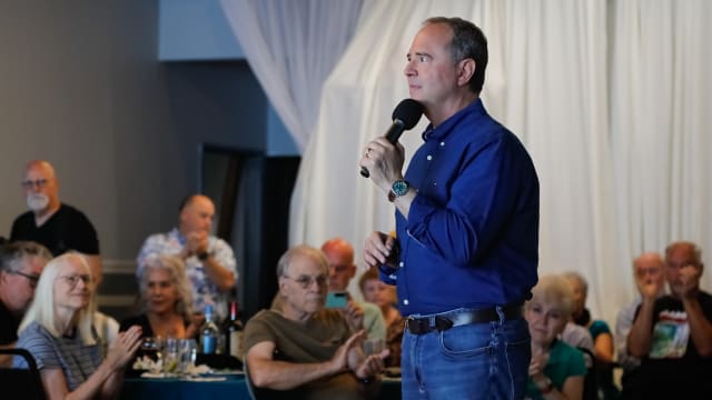 Rep. Adam Schiff speaks to prospective voters in the back room of Elijah’s Restaurant in San Diego on Sunday.