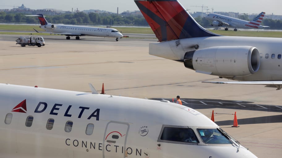 Delta planes on an airport tarmac