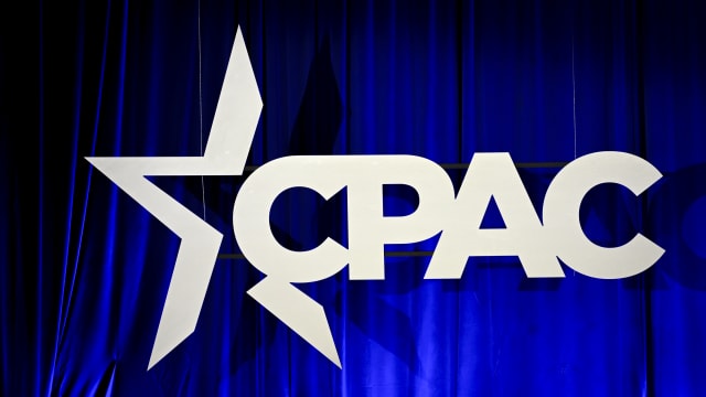 CPAC logo on a cloth background.
