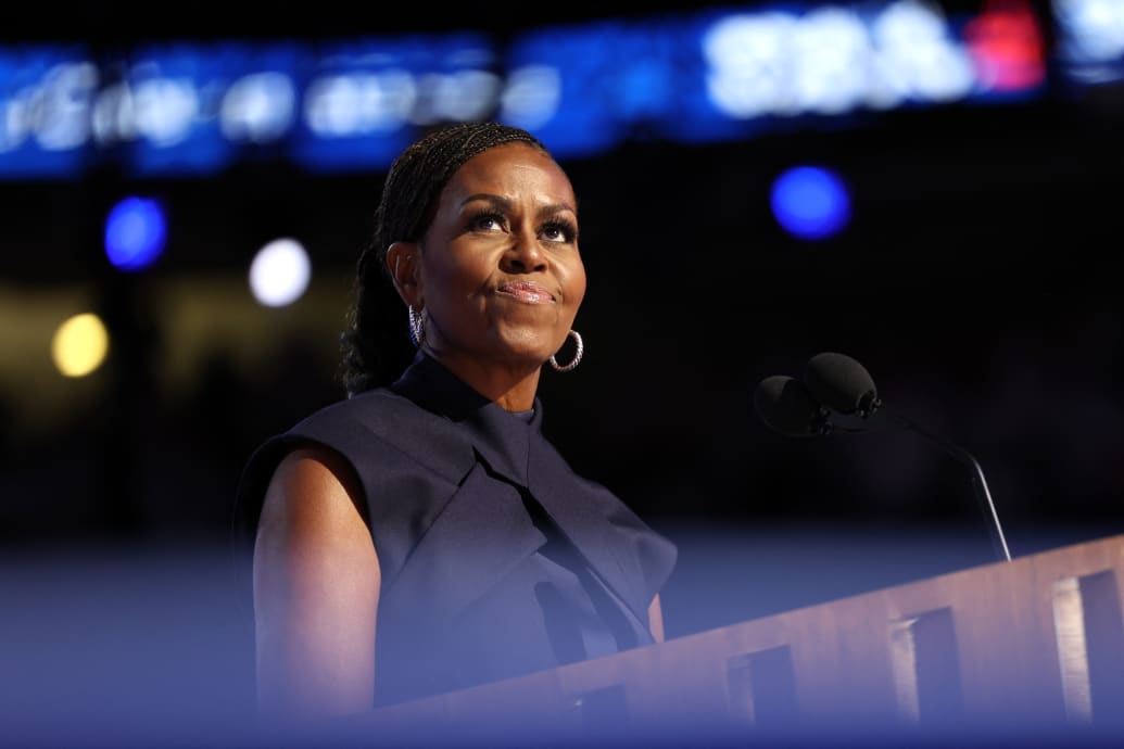 Former US First Lady Michelle Obama speaks on the second day of the Democratic National Convention (DNC) at the United Center in Chicago, Illinois, on August 20, 2024. 