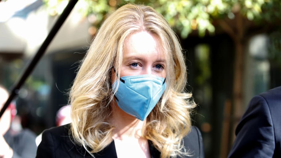Theranos founder Elizabeth Holmes leaves after attending her fraud trial at federal court in San Jose, California.