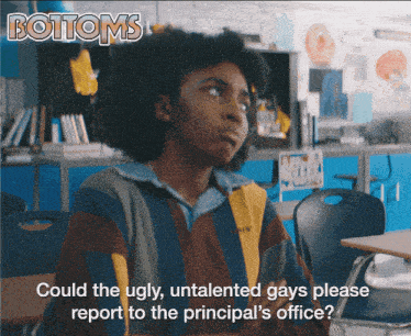 gif: Ayo Edibiris in a scene from 'Bottoms', text overlay reads: 'Could the ugly untalented gays please report to the principal's office"
