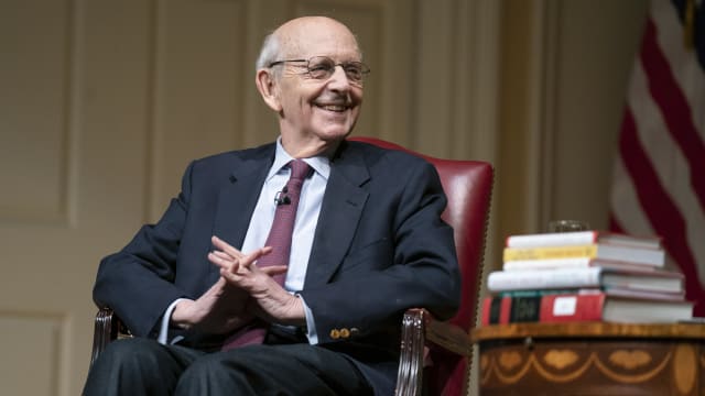 Supreme Court Justice Stephen Breyer smiles on February 17, 2022 in Washington, DC.