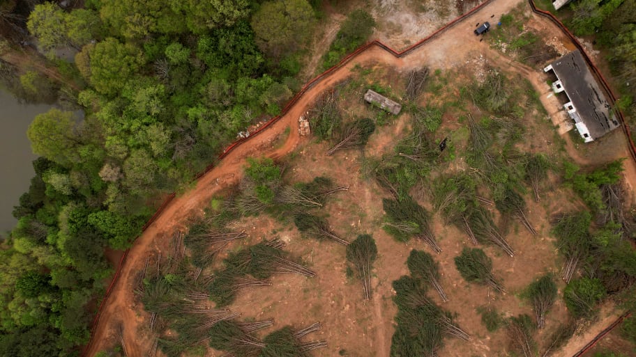 An aerial view of the planed site of a controversial \"Cop City\" project as the clear cutting of trees begins near Atlanta.