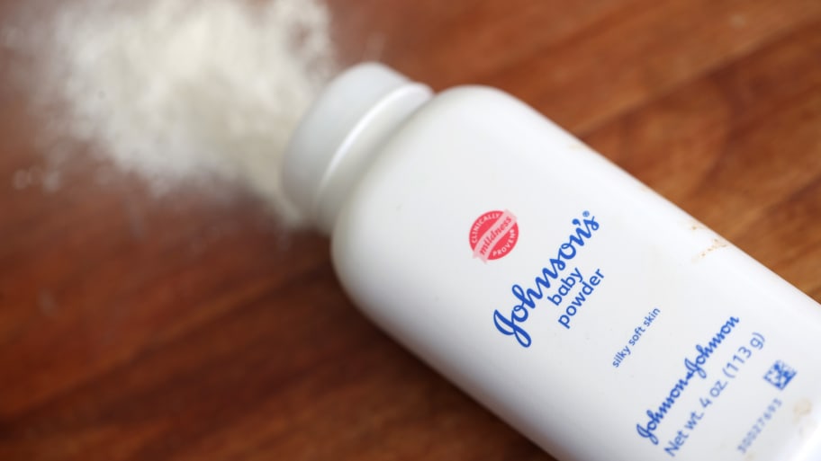 A bottle of Johnson & Johnson baby powder is displayed on a table on November 12, 2021