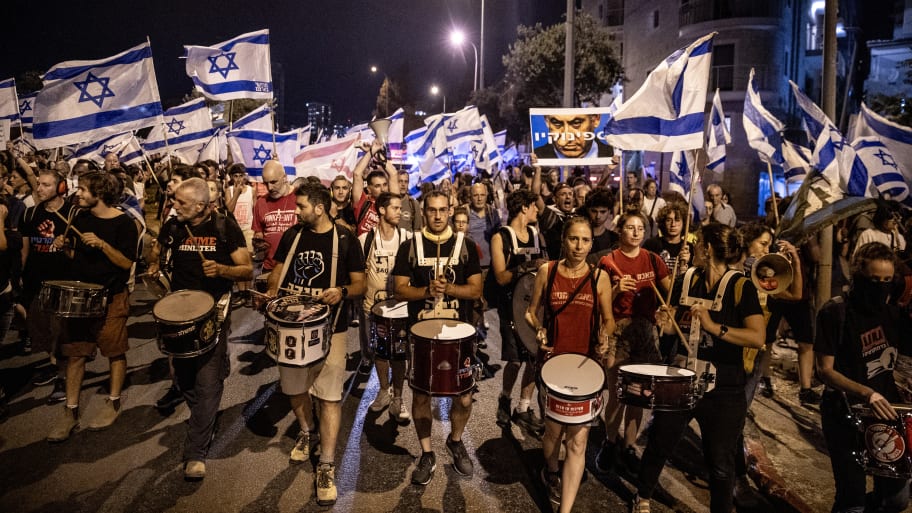 People gather outside Supreme Court during a demonstration against Israeli Prime Minister Benjamin Netanyahu.
