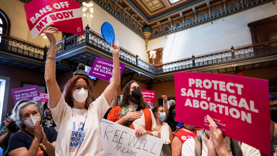 Protesters gather inside the South Carolina House as members debate a new near-total ban on abortion with no exceptions for pregnancies caused by rape or incest at the state legislature in Columbia, South Carolina, Aug. 30, 2022.