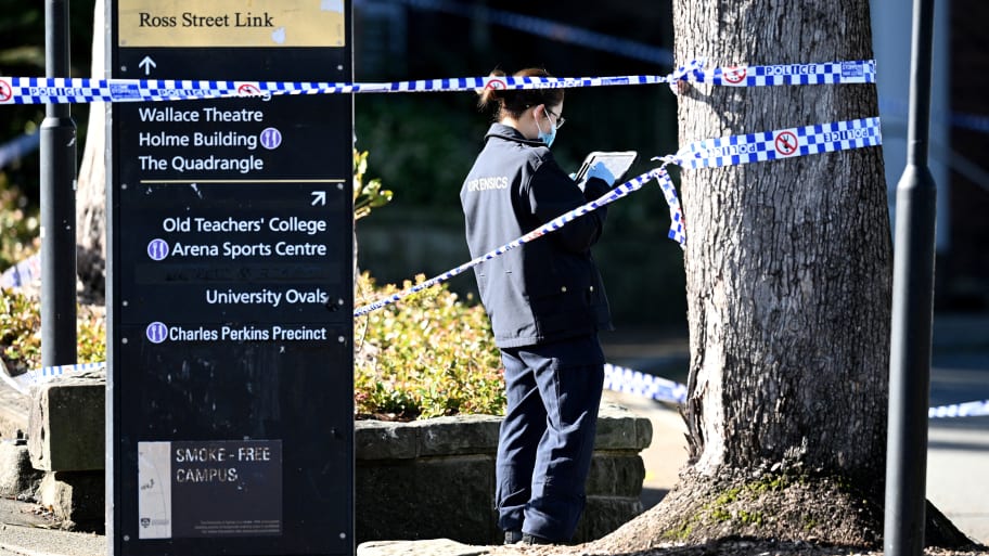 A member of the New South Wales (NSW) law enforcement team works at the scene of an alleged stabbing at the University of Sydney, in Sydney, Australia July 2, 2024. 