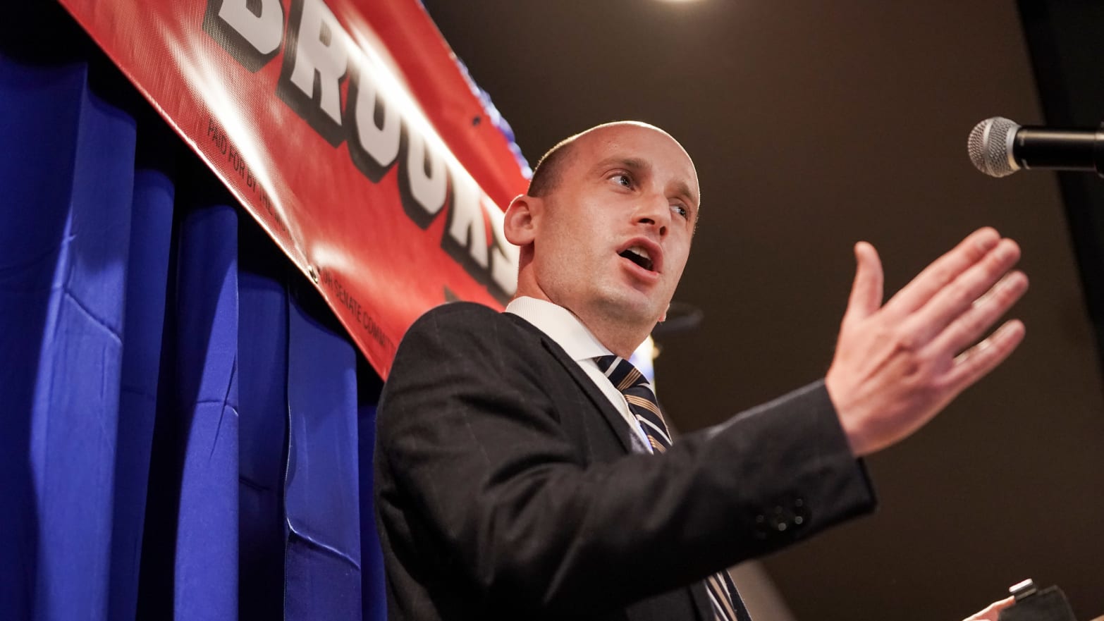 Former Trump adviser Stephen Miller speaks before U.S. Rep. Mo Brooks (R-AL) at a campaign rally