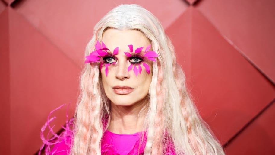 Model Kristen McMenamy poses on the red carpet at the Fashion Awards 2022 in London, on Dec. 5, 2022.