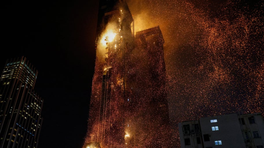 A building is seen on fire in Hong Kong, China March 3, 2023.