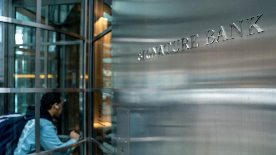 A person walks into the lobby of the Signature Bank headquarters in New York City, March 13, 2023. 