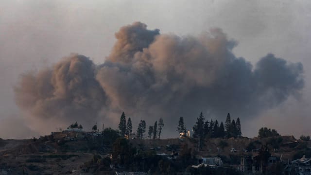 Smoke rises after an explosion during Israel’s bombardment of central Gaza on Jan. 9 2024. 