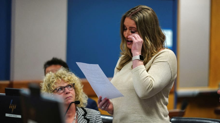 Jenna Ellis reads a statement after Ellis plead guilty to a felony count of aiding and abetting false statements and writings, inside Fulton Superior Court