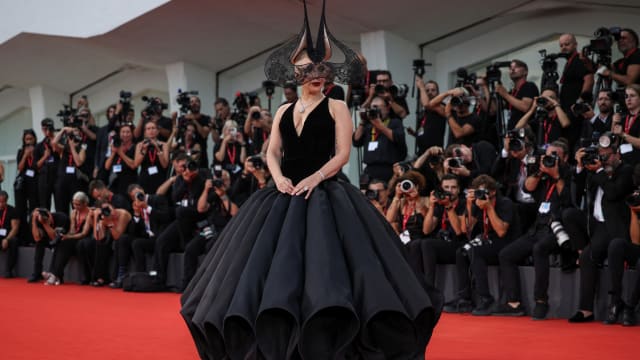 Lady Gaga poses on the red carpet ahead of the premiere of "Joker: Folie a Deux" during the Venice Film Festival on September 4, 2024.