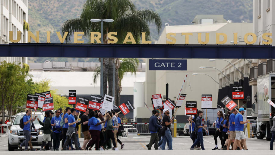 Workers and supporters of the Writers Guild of America protest outside Universal Studios Hollywood after union negotiators called a strike for film and television writers, in the Universal City area of Los Angeles, California, U.S., May 3, 2023. 