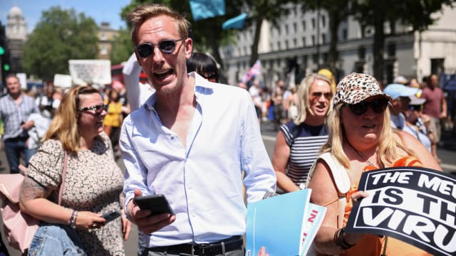 Laurence Fox takes part in an anti-lockdown and anti-vaccine demonstration, near parliament, London, Britain, June 14, 2021.