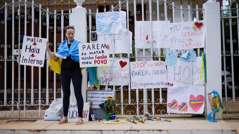 A demonstrator takes part in an anti-war protest in support of Ukraine amid Russia's invasion, outside the Ukrainian Embassy in Brasilia, Brazil March 2, 2022.