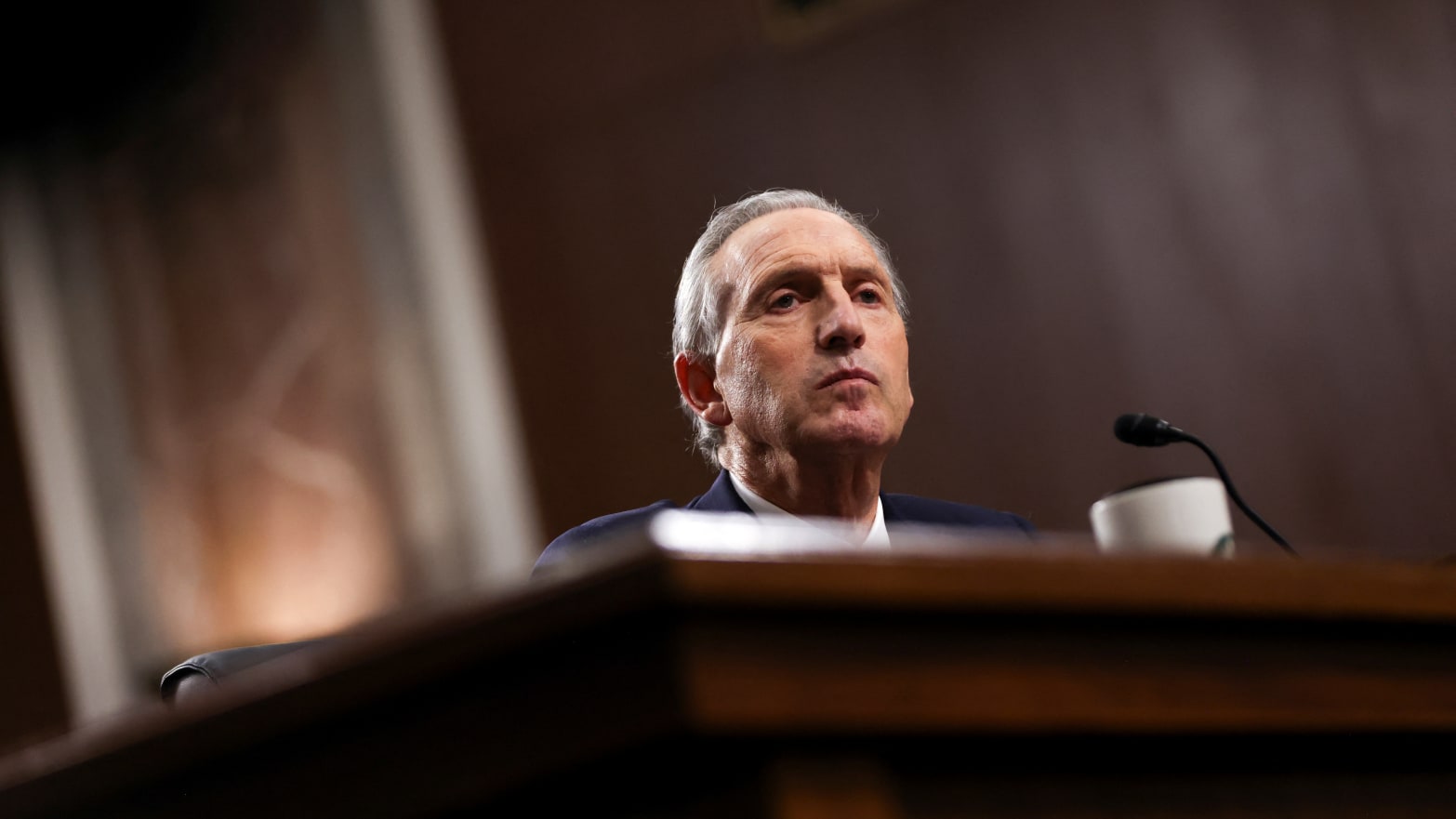 Former Starbucks Chief Executive Officer Howard Schultz testifies at a Senate hearing