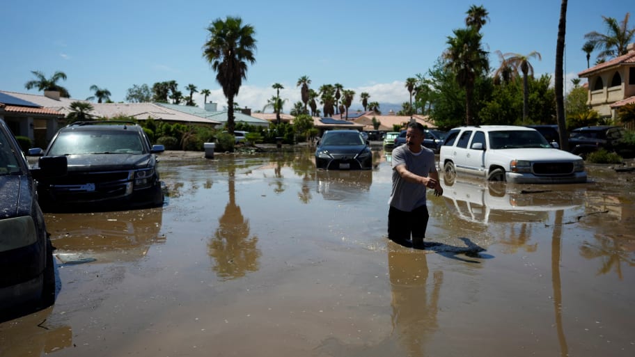 A picture of a flooded street after Tropical Storm Hilary passed California. Just as Tropical Storm Hilary raged through Southern California, Texas Gov. Greg Abbott bused 37 migrants into Los Angeles.