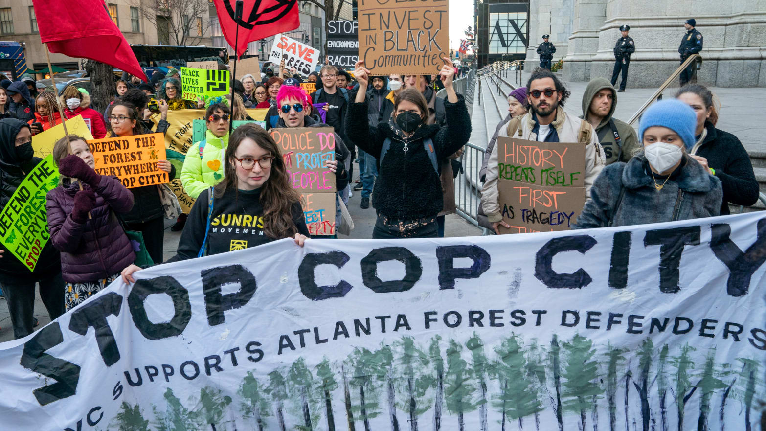Protesters march against the construction of Cop City, a police training facility outside Atlanta, Georgia. 