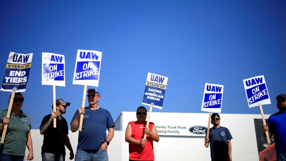 United Auto Workers (UAW) union members picket outside Ford's Kentucky truck plant after going on strike in Louisville, Kentucky.