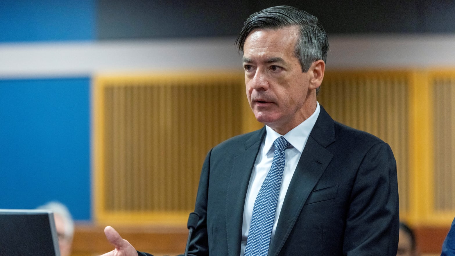 Kenneth Chesebro, wearing a suit, speaks to a judge in an Atlanta courtroom.